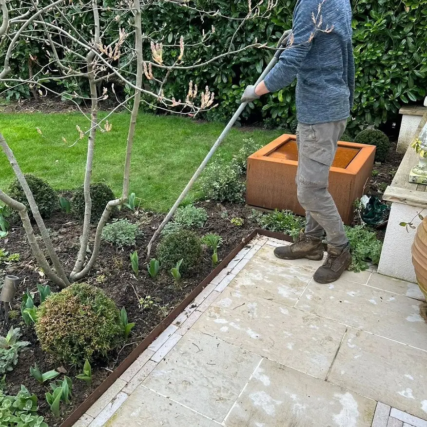 Man maintaining a Maidstone Garden