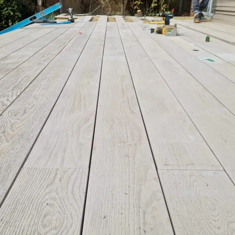 Close-up detail of composite decking boards showing natural wood grain texture and color variation