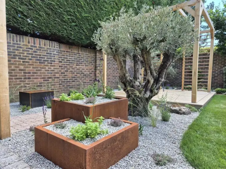 Close-up of layered planting beds with diverse textures and colours in Maidstone garden